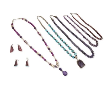 A group of Southwest silver, purple shell and stone jewelry