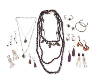 A large group of Southwest-style silver and purple stone jewelry