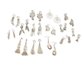 An assortment of Southwest-style silver earrings