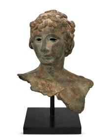 A Classical-style patinated metal bust