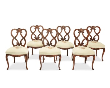 A set of Italian Rococo-style needlepoint side chairs