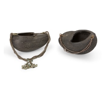 Two Islamic coco de mer kashkul begging bowls