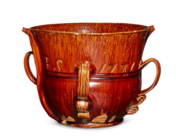 An unusual English redware posset pot