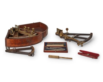A group of nautical charting and ship's navigational instruments
