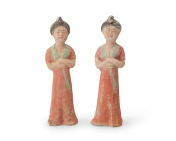 A pair of Chinese pottery court lady figures