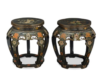 A pair of Chinese black lacquered stools