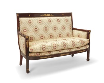 An Empire upholstered mahogany canape