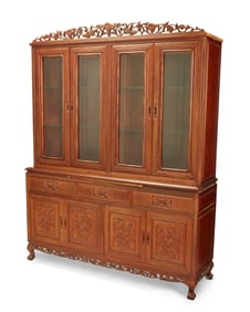 An Indonesian mahogany china cabinet