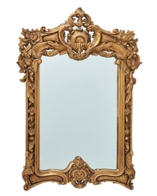 A Baroque-style giltwood mirror