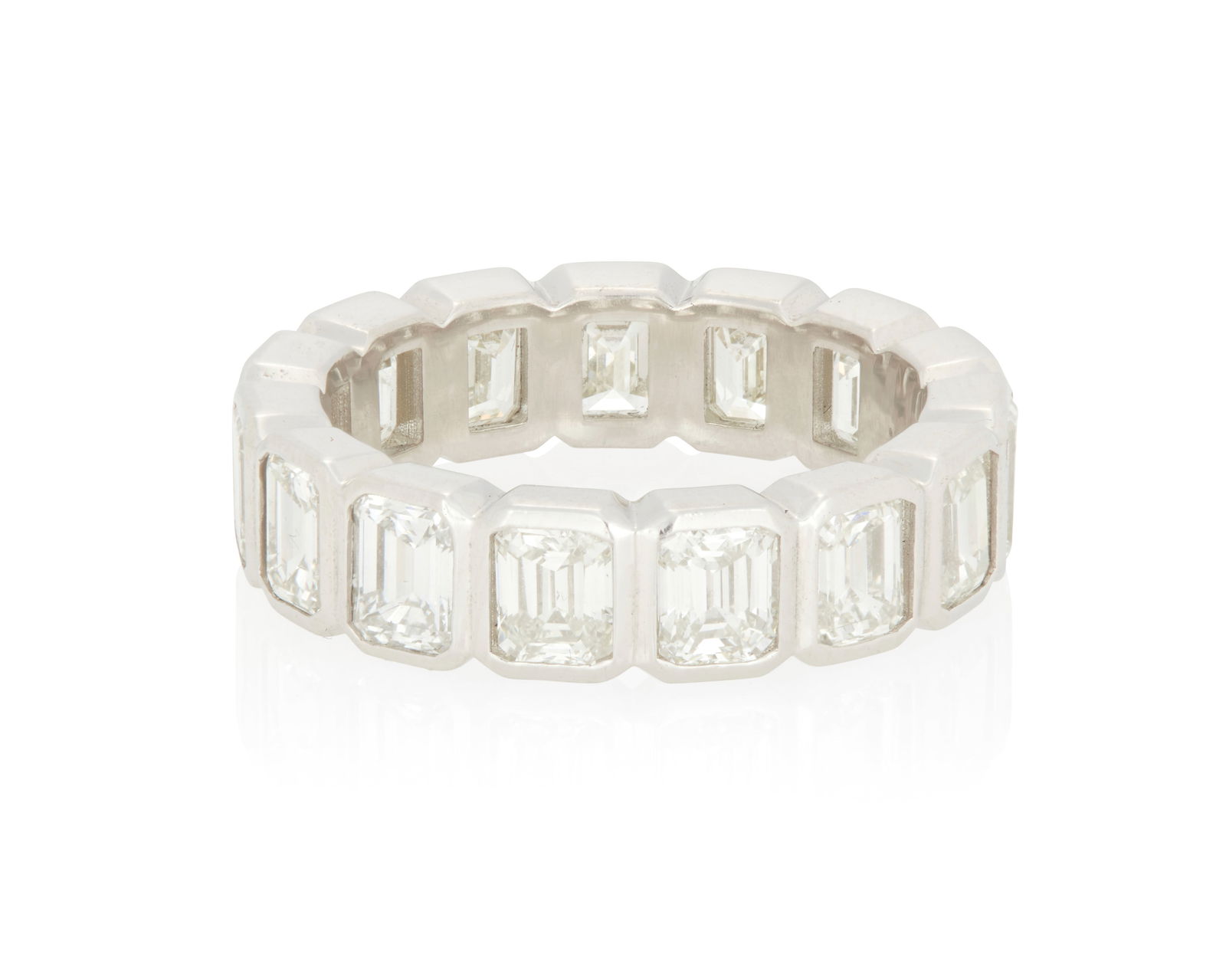 A Platinum and Diamond Eternity Band: A Platinum and Diamond Eternity BandFeaturing fifteen emerald-cut diamonds weighing approximately 4.86 caratsSize: 6 1/48.7 grams gross