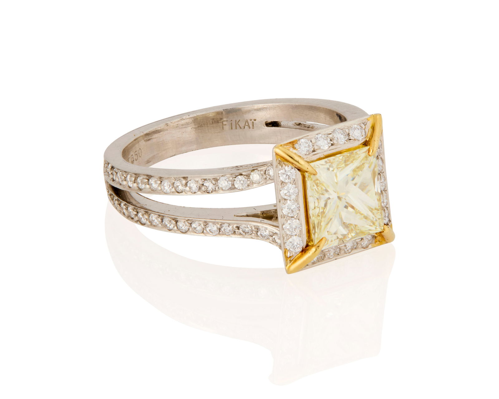 A Platinum, Colored Diamond and Diamond Ring (1 of 3)