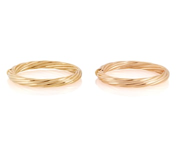 A Pair of 18K Rose and Yellow Gold Bangles
