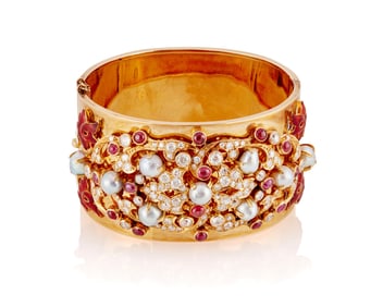 An 18K Gold, Diamond, Pearl and Ruby Hinged Bangle