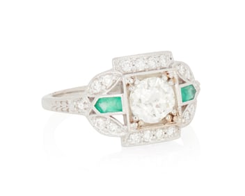 An 18K White Gold, Diamond and Emerald Ring