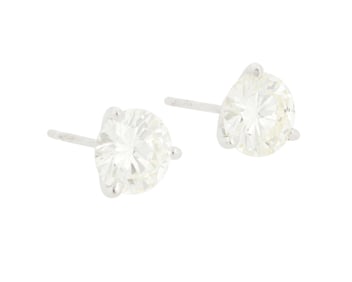 A Pair of White Gold and Diamond Stud Earrings