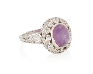 An Early 20th Century Platinum, Pink Star Sapphire and Diamond Ring
