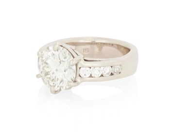 A 14K White Gold and Diamond Ring