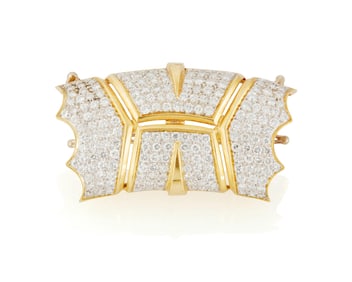 An 18K Gold and Diamond Enhancer