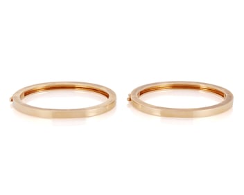A Pair of 14K Gold Bangles