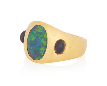 A 22K Gold, Black Opal and Sapphire Ring