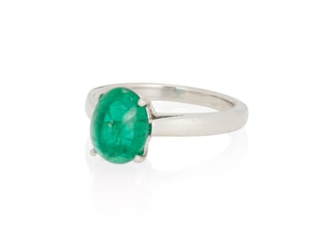 A Platinum and Emerald Ring