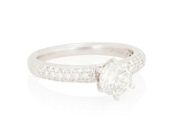 A 14K White Gold and Diamond Ring