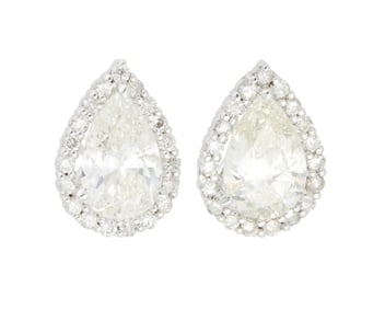 A Pair of White Gold and Diamond Stud Earrings