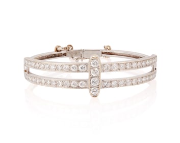 A 14K White Gold and Diamond Bangle