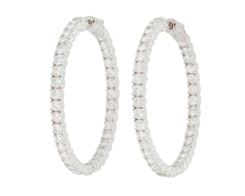 A Pair of 14K White Gold and Diamond Hoops