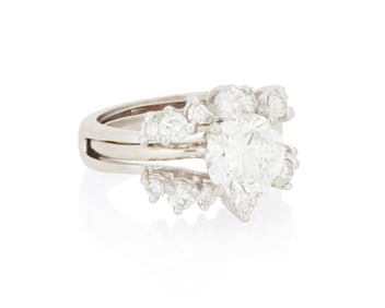 A 14K White Gold and Diamond Ring and Jacket