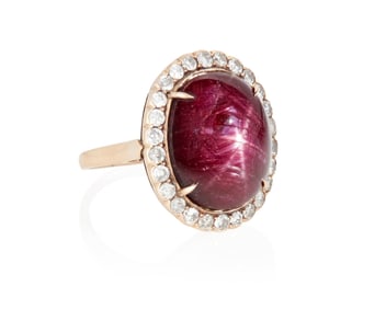 A Gold, Star Sapphire and Diamond Ring