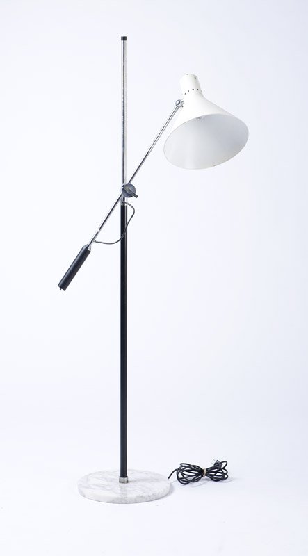 An Arredoluce single-arm floor lamp: Circa 1960, unmarked, the flaring enameled metal shade on an adjustable chrome-plated arm with leather-wrapped handle, attached to a black-enameled stem mounted on a circular marble base, to top of st