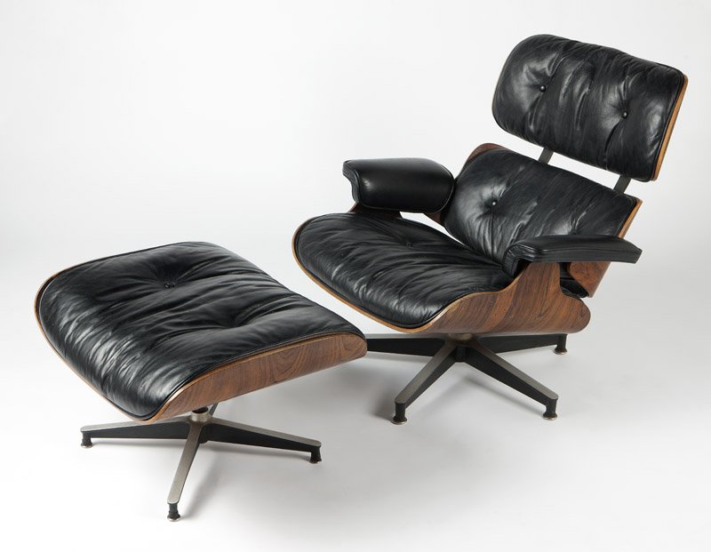 Eames/Herman Miller lounge chair 670 ottoman 671: Second half 20th century, unsigned, cushion tag of chair has been cut off and taped to underside of ottoman, each with rosewood-veneered five-ply molded wood shell and black leather cushion over polis
