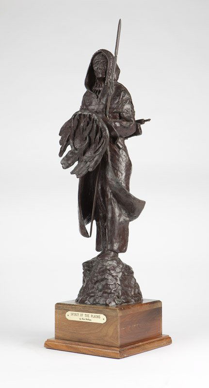 Fred Fellows (1934-* Sonoita, AZ): ''Spirit of the Plains'', standing figure of a Native American man with spear and shield, on an integral naturalistic base, raised on a square stepped wooden plinth, incised with signature on the base