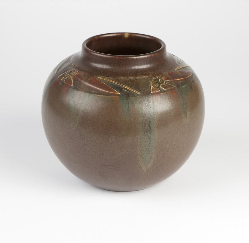 A Rookwood pottery matte glaze vase, C.S. Todd: 1915, with Rookwood flame and date marks, decorator's mark ''C.S.T.'' (Charles Stewart Todd 1910 - 1922), shape number ''112'', the short circular neck over a bulbous body covered with brown glaze, th