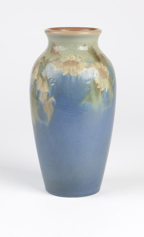 A Rookwood matte glaze floral vase, Rothenbusch: 1926, with Rookwood flame and date marks, decorator's mark 'R' (Frederick Daniel Henry Rothenbusch 1896 - 1931) and shape number '534C', the flared rim over a hipped, tapering body glazed in blue, gre