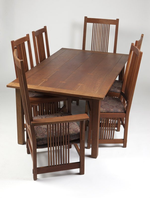 A contemporary Stickley Mission style dining set