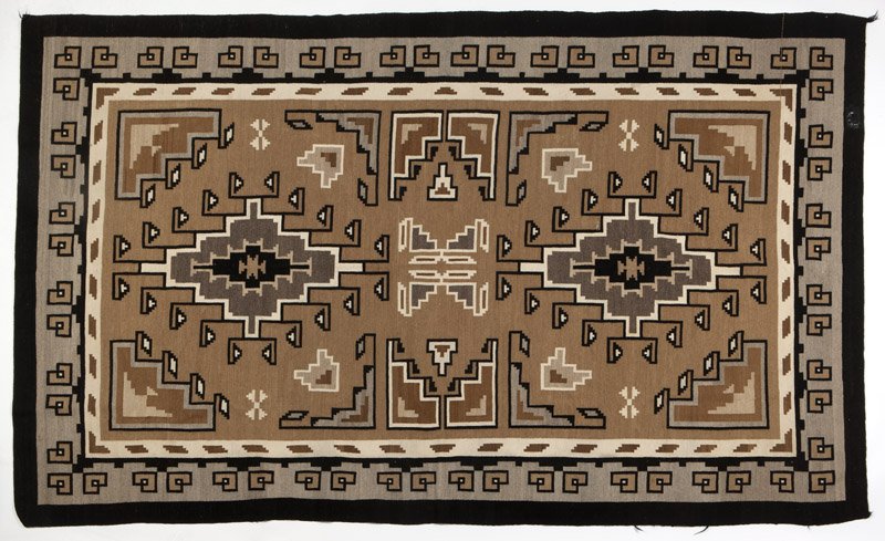 A Navajo Two Grey Hills blanket, Ruth Teller: Circa 1969, woven by Ruth Teller (b. 1927), woven of tan, grey, black and ivory wool in a double-diamond design, 9'8'' H x 6'0'' W, est:$5000/7000 Literature: For information on Ruth Teller and other 
