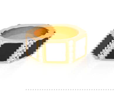 An 18K Gold and Onyx Ring: An 18K Gold and Onyx Ring Featuring six onyx tablets accented by twenty-four round diamonds weighing approximately 0.48 carat Size: 5 11.8 grams gross