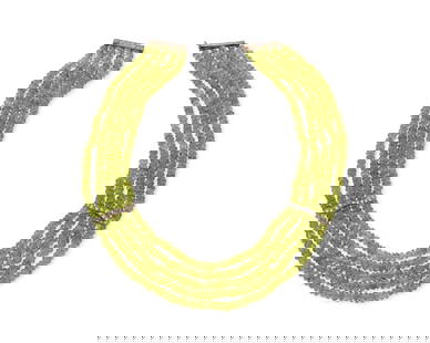 A Silver, Peridot and Diamond Necklace: A Silver, Peridot and Diamond Necklace Featuring five strands of faceted peridot beads, accented by diamond set silver stations and finished with a silver clasp Length: 16-18 in. 148.2 grams gross