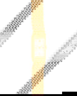 Gilchrist: A Gold Watch: Gilchrist: A Gold Watch Dial: 8.7mm, rectangular with Diver hour markers Case: 10.2mm Closure: 14k woven gold bracelet Inner circumference: 8 in. 36.2 grams gross