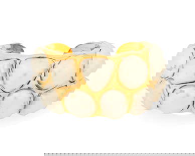 CHANEL: A Vintage 1990s Gold Tone and Faux Pearl Cuff: CHANEL: A Vintage 1990s Gold Tone and Faux Pearl Cuff A chunky tapered cuff bracelet with large inset faux pearls, signed to plaque: Chanel; Made in France; [Season] 26 Inner circumference: 6 1/2