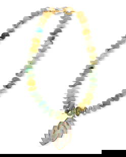 A Gold, Blue Opal and Shell Necklace: A Gold, blue opal and Shell Necklace Featuring rondelle style chrysoprase beads measuring approximately 15.00 mm, finished with an 18k gold and shell pendant Length: 18 in. 112.1 grams gross