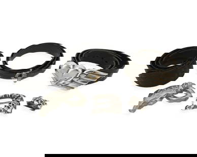 A Group of Belt Buckles and Leather Belts: A Group of Belt Buckles and Leather Belts Late 20th century Three variously marked for maker and for sterling Comprising a Stephen Dweck sterling silver buckle with matching keeper, each with