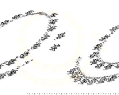A Set of Mexican Sterling Silver Jewelry: A Set of Mexican Sterling Silver Jewelry Mid/late 20th century Two marked: Sterling; earrings marked to post: Silver / Mexico Three works comprising a delicate sterling silver Margot de Taxco-style