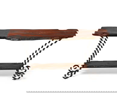 A Spanish-style wood and iron console table: A Spanish-style wood and iron console tableLate 20th/early 21st centuryThe table with live edge wood tabletop and undershelf supported on a black enameled wrought iron frame with scrolled feet29.75&qu