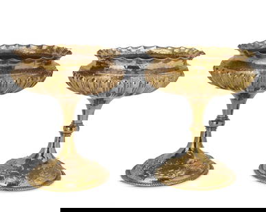 A pair of Egidio Casagrande brass compotes: A pair of Egidio Casagrande brass compotes Mid-20th century; Italy Marked to the underside: E. Casagrande / Italy / Borgo Valsugana / 142 Each hammered brass compote with all-over repousse and chased