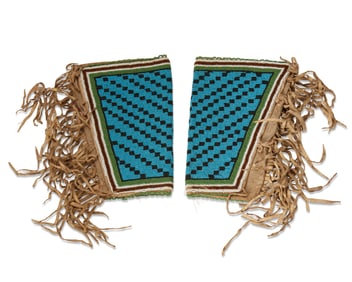 A pair of Plateau-style beaded gauntlet cuffs