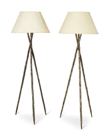 A pair of tripod floor lamps