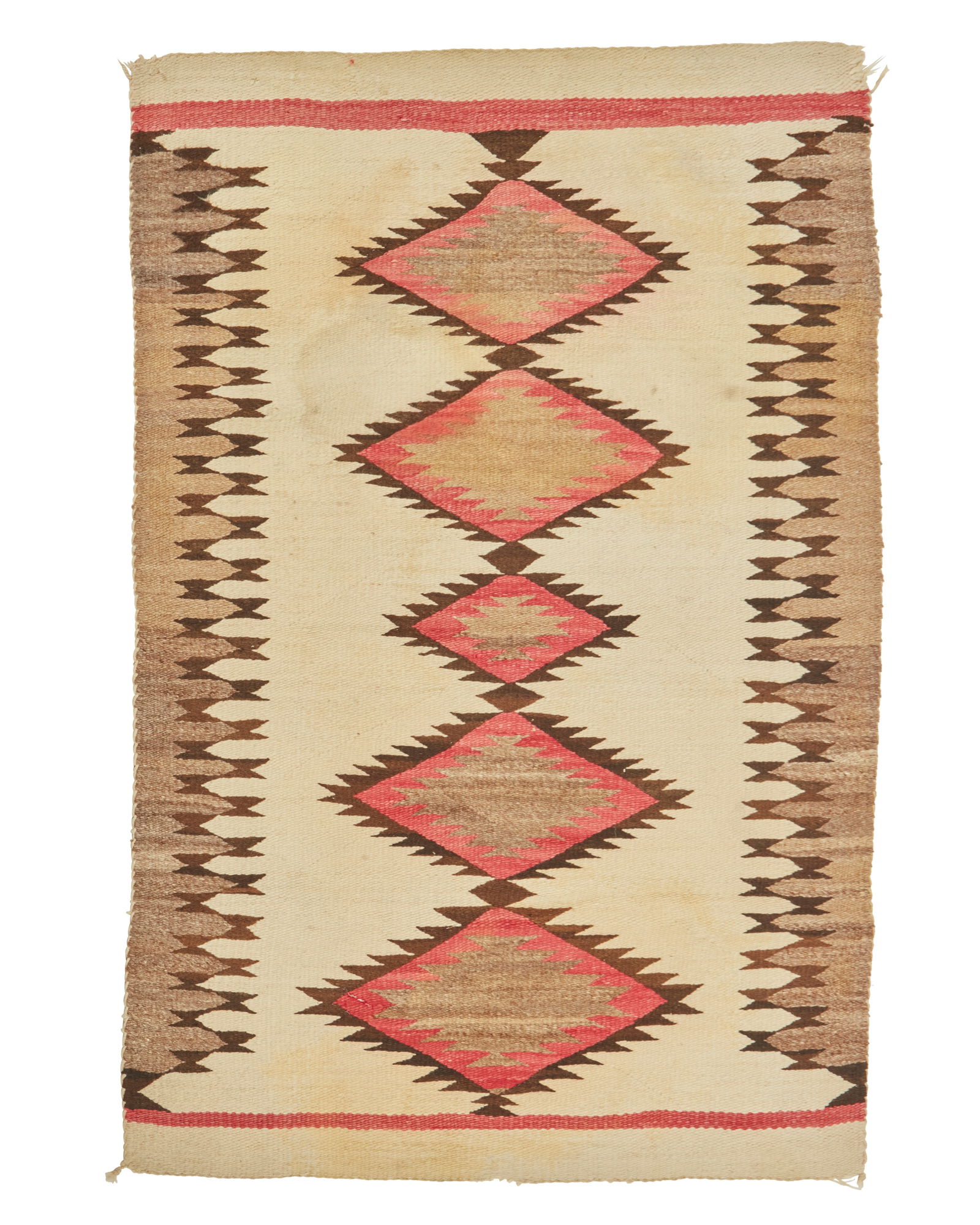 A Navajo regional rug: A Navajo regional rugMid-20th century, DineWoven in variegated brown/grey, red, brown, and cream wool with a central column of stacked serrated diamonds, and a complex serrated border to two sides57.5